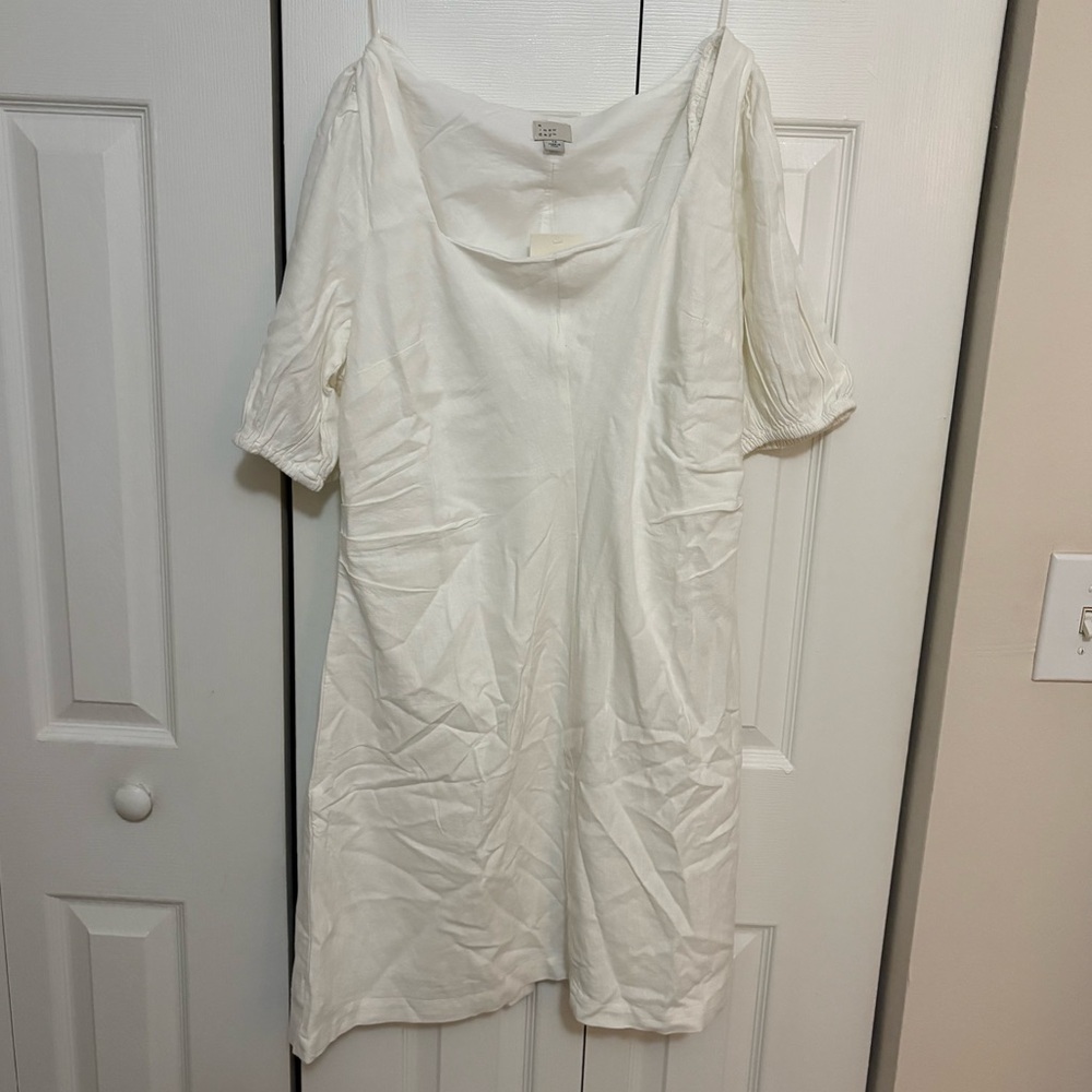 A New Day Cream Dress. Nice Wedding Dress Economically Priced